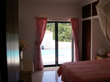 villa peach bedroom